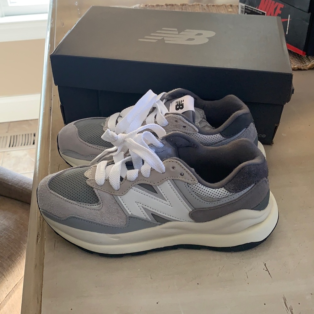 Brand new New Balances with box. Women’s size 7, Men’s size 5.5
